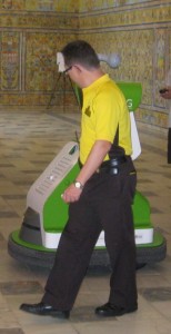 Just kept missing this security guard patting the robot ...