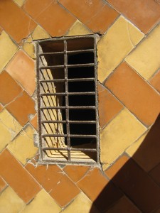 grate in glazed tiles (with an interesting view of the floor below)