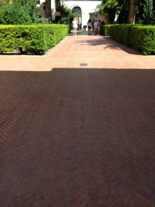 overview red herringbone laid bricks in concrete