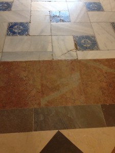 transition from marble tiles to marble tiles with glazed tile patterns