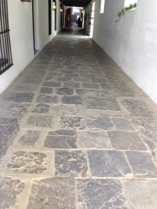 overview of covered walkway with natural flagstones