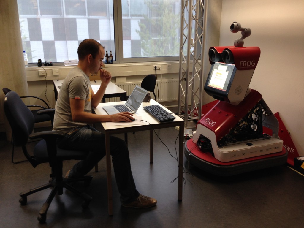 The simulation setup. As you can see, the robot isn't going anywhere. And, the researchers have recently been working late and have forgotten to take out the empties. Fortunately the pizza boxes had disappeared.